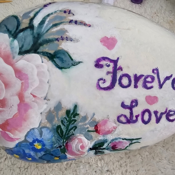 Painted LOVE river rock with rosy- peach roses, blue accent flowers, and hearts - Picture 9 of 17